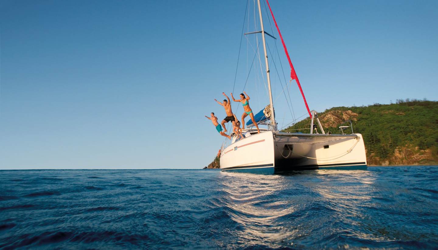 Australia - People jumping off a boat in Australia