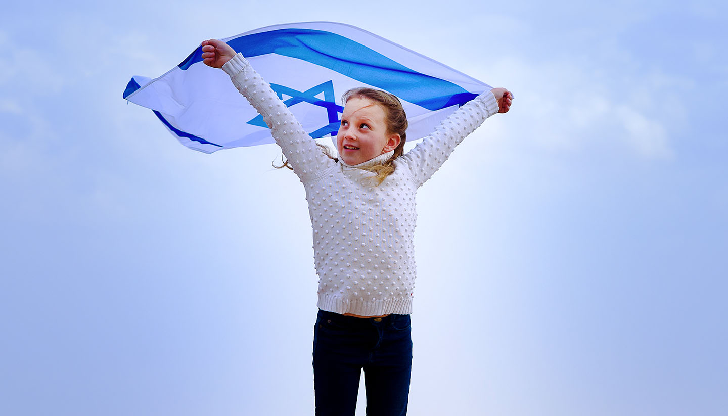 Israel - Girl holding Israel flag